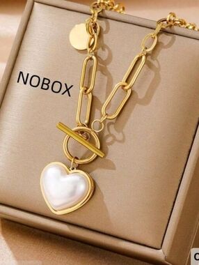 Necklace with a heart shaped pearl
